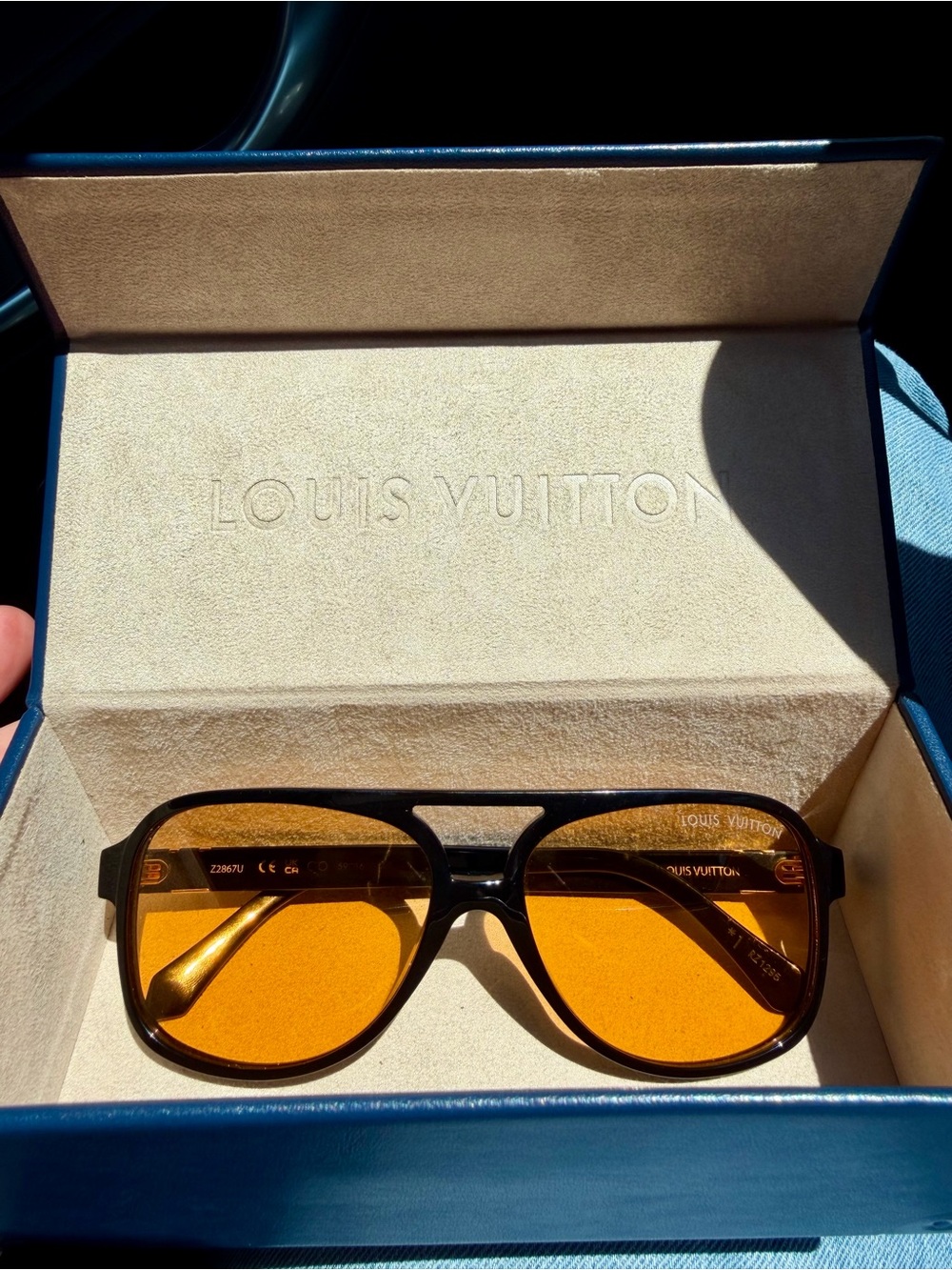 Louis Vuitton Sunglasses - Black Frame with Amber/Orange Lenses